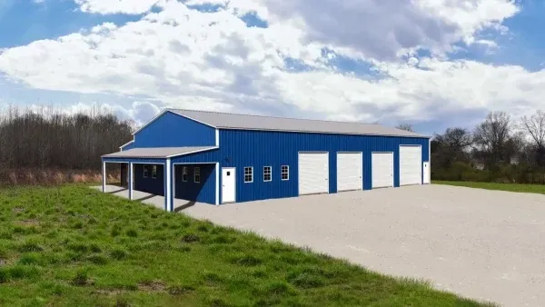 Blue commercial building with multiple garage doors