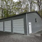Metal Garages- Big Stone Gap VA 30x50x12 side entry garage with four 10x10 roll up doors
