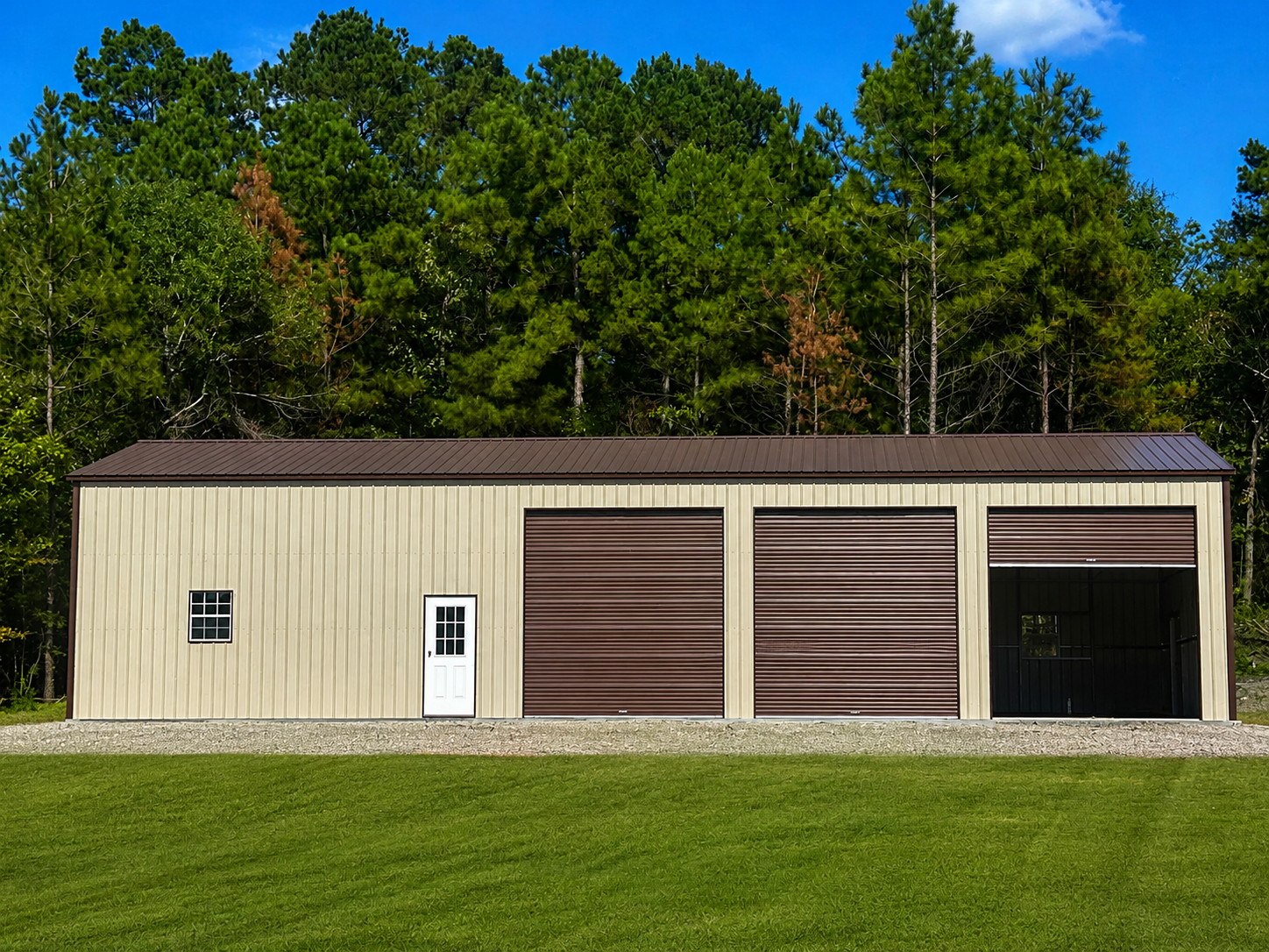 Large vertical roof metal garage installed by Johnson Carports and Garages